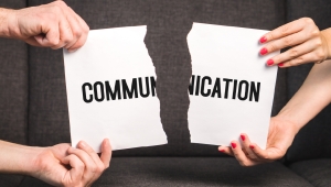 Moving Beyond Intent: Addressing Identity-Linked Communication Failures 