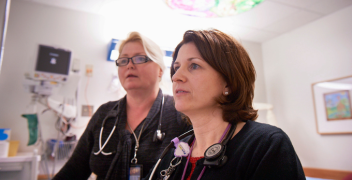 CHOP nurses looking at computer screen