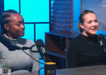 two women sitting in front of microphones during podcast interview